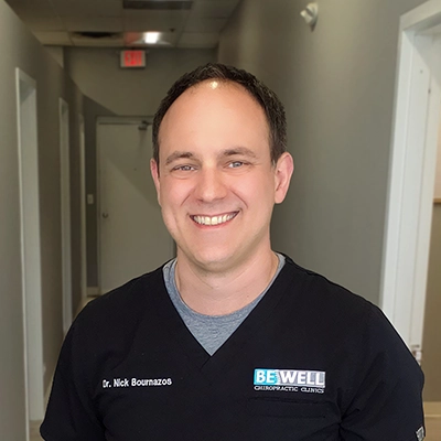 Chiropractor Nick Bournazos Smiling In The Office